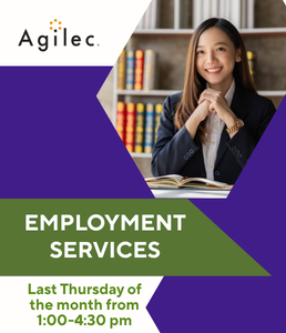 Photograph of a professionally-dressed woman sitting at a table