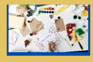 photograph of holiday cards and craft supplies