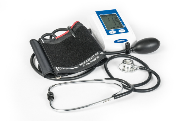 photo of a blood pressure cuff, monitor and stethoscope