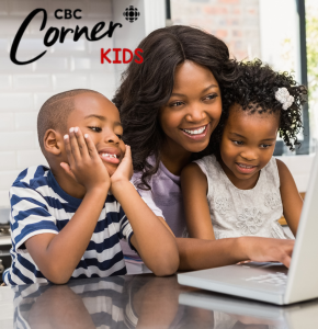 mother and 2 children looking at a computer
