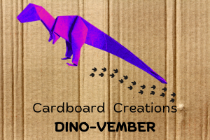 picture of a origami dinosaur on a piece of cardboard