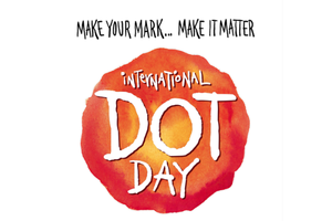 variegated orange circle with the words Internation Dot Day on it