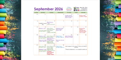 image of a calendar page on the background of coloured chalk against a blackboard