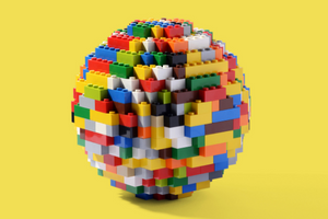 sphere made of LEGO on a yellow background