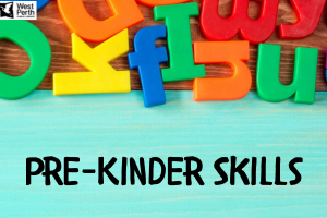 photo of plastic letters against blue background with the words Pre-Kinder Skills