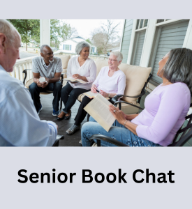 photograph of a group of people holding books sitting on a porch